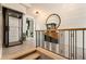 Modern home's hallway with an elevator and stairs at 211 N Esplanade, Alpharetta, GA 30009