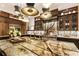Modern kitchen with marble countertops, custom cabinets, and pendant lighting at 211 N Esplanade, Alpharetta, GA 30009