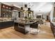 Spacious kitchen with island, high-end appliances, and hardwood floors at 211 N Esplanade, Alpharetta, GA 30009