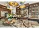 Modern kitchen features stunning marble countertops and designer lighting at 211 N Esplanade, Alpharetta, GA 30009