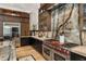 Modern kitchen with professional range, custom cabinetry, and marble backsplash at 211 N Esplanade, Alpharetta, GA 30009