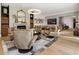 Living room with a fireplace and comfortable seating at 211 N Esplanade, Alpharetta, GA 30009