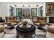 Living room with a view of a private courtyard at 211 N Esplanade, Alpharetta, GA 30009