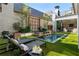 Relaxing pool area with water feature and lush landscaping at 211 N Esplanade, Alpharetta, GA 30009