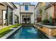 Private backyard retreat with pool, waterfall, and lounge chairs at 211 N Esplanade, Alpharetta, GA 30009