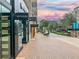 Upscale retail area with various stores and restaurants at sunset at 211 N Esplanade, Alpharetta, GA 30009