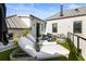 Luxurious rooftop deck with lounge chairs and fire pit at 211 N Esplanade, Alpharetta, GA 30009