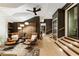 Spacious sitting room with leather armchairs and a large artwork at 211 N Esplanade, Alpharetta, GA 30009