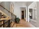 Modern staircase with wood and metal accents, leading to the upper level at 211 N Esplanade, Alpharetta, GA 30009