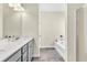 Bathroom with double vanity, soaking tub, and separate shower at 9026 Jim Purcell Dr, Covington, GA 30014
