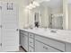 Double vanity bathroom with a walk-in shower at 9026 Jim Purcell Dr, Covington, GA 30014