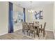 Bright dining room with hardwood floors and a chandelier at 9026 Jim Purcell Dr, Covington, GA 30014