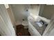 Small bathroom with a shower, toilet and granite vanity at 1272 Marlwood Ct, Stone Mountain, GA 30083