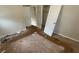 Spacious carpeted bedroom with doors to closets and hallway at 1272 Marlwood Ct, Stone Mountain, GA 30083