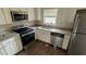 Kitchen with stainless steel appliances and granite countertops at 1272 Marlwood Ct, Stone Mountain, GA 30083