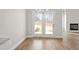 Dining area with hardwood floors and French doors leading to patio at 4150 Cavalier Way, Duluth, GA 30097