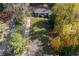 An aerial view of a charming home with a large, well-manicured front lawn surrounded by mature trees at 1141 Goodwin Ne Pl, Brookhaven, GA 30319