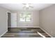 Large bedroom with ceiling fan and window at 3130 Mars Hill Rd, Acworth, GA 30101