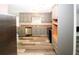Updated kitchen with gray cabinets and stainless steel appliances at 3130 Mars Hill Rd, Acworth, GA 30101
