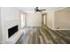 Living room with fireplace and wood-look floors at 3130 Mars Hill Rd, Acworth, GA 30101