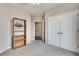 Bedroom featuring carpeting, a ceiling fan, and a closet with double doors at 1965 Nocturne Dr # 1209, Alpharetta, GA 30009