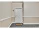 Exterior shot of front door with a welcome mat and unit number 1209 at 1965 Nocturne Dr # 1209, Alpharetta, GA 30009