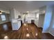 Renovated kitchen with white cabinets and hardwood floors at 101 Mountain Brook Dr, Cumming, GA 30040