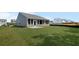 Lush green backyard with patio and exterior view of home at 106 Cherry Glen Way, Euharlee, GA 30145