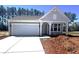 Charming one-story home with a modern farmhouse design, attached garage, and new concrete driveway at 106 Cherry Glen Way, Euharlee, GA 30145