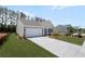 Attractive single-story home showcasing a clean driveway, lush lawn, and a two-car garage at 106 Cherry Glen Way, Euharlee, GA 30145