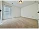 Bedroom featuring neutral carpet, and bright light at 1395 Ben Park Way, Grayson, GA 30017