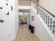 Spacious foyer featuring hardwood floors and a grand staircase at 545 Montrose Ln, Sandy Springs, GA 30328