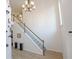 Bright foyer with hardwood floors, staircase, and chandelier at 545 Montrose Ln, Sandy Springs, GA 30328