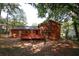 Brick home with deck and spacious backyard at 500 Carillon Ct, Stone Mountain, GA 30083