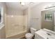 Clean bathroom with tub and shower combination at 500 Carillon Ct, Stone Mountain, GA 30083