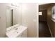 Bathroom with vanity and mirror, near bedroom at 500 Carillon Ct, Stone Mountain, GA 30083
