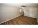 Large bedroom with ceiling fan and vinyl flooring at 500 Carillon Ct, Stone Mountain, GA 30083