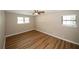 Spacious bedroom with ceiling fan and vinyl flooring at 500 Carillon Ct, Stone Mountain, GA 30083