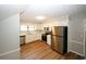 Updated kitchen with stainless steel appliances and white cabinets at 500 Carillon Ct, Stone Mountain, GA 30083