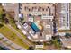 Aerial view showcasing the complex amenities: pool, gym, dog park, parking deck, and package room at 821 Ralph Mcgill Ne Blvd # 2303, Atlanta, GA 30306