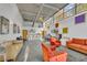 Spacious community room with ample seating, a bar area, and large windows providing natural light at 821 Ralph Mcgill Ne Blvd # 2303, Atlanta, GA 30306