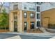 Exterior view of apartment building with brick and stone facade, multiple windows and covered entrance at 821 Ralph Mcgill Ne Blvd # 2303, Atlanta, GA 30306