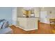 This home features a kitchen view, a breakfast bar, hardwood floors and stainless appliances at 821 Ralph Mcgill Ne Blvd # 2303, Atlanta, GA 30306