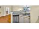 Open kitchen with granite countertops, stainless steel appliances, and a breakfast bar overlooking the living area at 821 Ralph Mcgill Ne Blvd # 2303, Atlanta, GA 30306