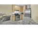 Well-appointed kitchen featuring granite countertops, stainless steel appliances, and white cabinets for a clean look at 821 Ralph Mcgill Ne Blvd # 2303, Atlanta, GA 30306