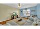 Inviting living room featuring a plush sofa, a glass coffee table, and a TV for entertainment at 821 Ralph Mcgill Ne Blvd # 2303, Atlanta, GA 30306
