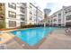 Refreshing community pool with a fountain feature and well-maintained deck area for residents at 821 Ralph Mcgill Ne Blvd # 2303, Atlanta, GA 30306