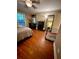 Bright bedroom with wood floors, ample closet space, and a ceiling fan at 710 River Run Dr, Atlanta, GA 30350