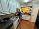 Bright kitchen featuring white cabinets and granite countertops at 710 River Run Dr, Atlanta, GA 30350