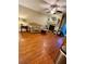 Spacious living room with hardwood floors, fireplace and a comfortable couch at 710 River Run Dr, Atlanta, GA 30350